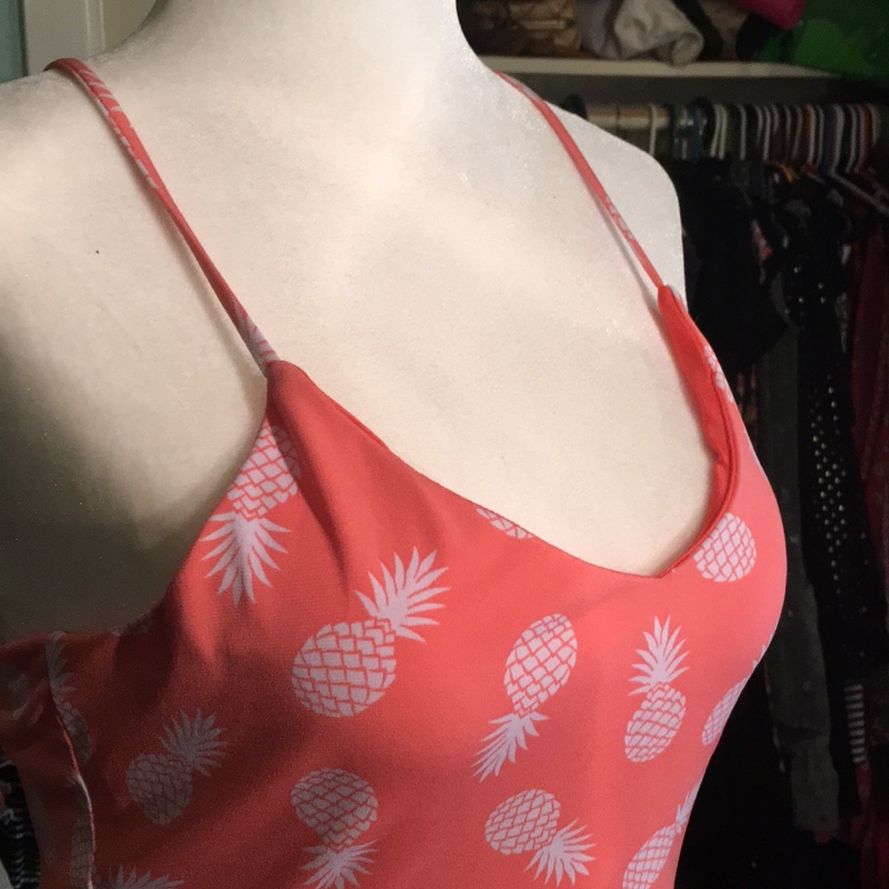 Peach pineapple dress.
